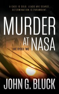 MURDER AT NASA by John G. Bluck book cover featuring a sunrise/sunset in the background beside a manned shuttle